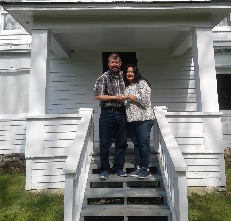 Stewart Kukowski and Michelle Garcia pose on the front porch of the Laura Ingalls Wilder farmhouse just after Michelle said “Yes” to Stewart’s proposal.